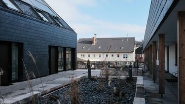 Foto: Julie Lorang, PUR+ Architekten Stein Hemmes Partner GmbB, Kasel Innenhof