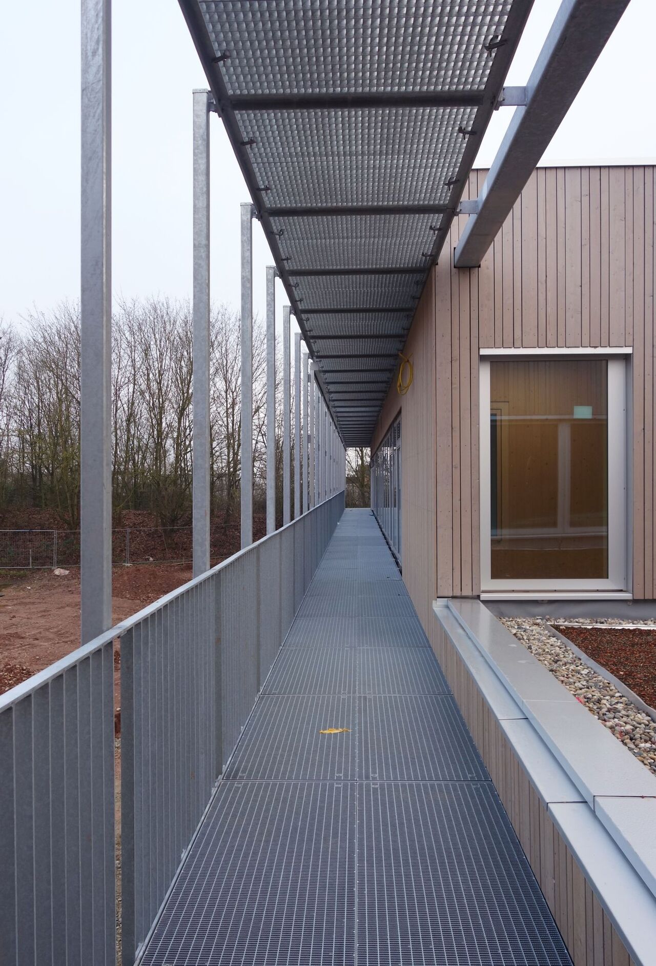 Foto: Andrea Rappold, Bau Eins Architekten, Kaiserslautern - Deutschland Kita "Estricher Weg" Laubengang